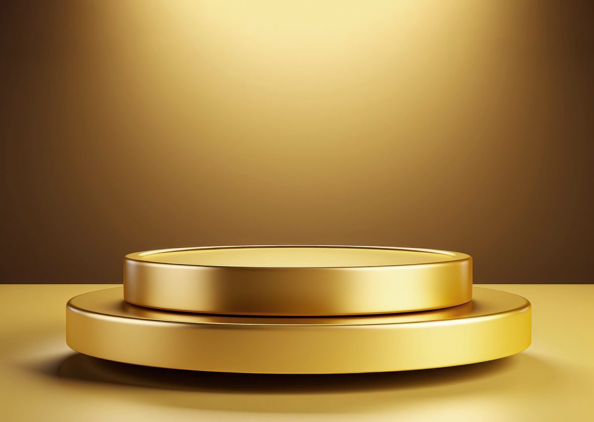 Simple round gold empty podium for product presentation on a minimalist backdrop