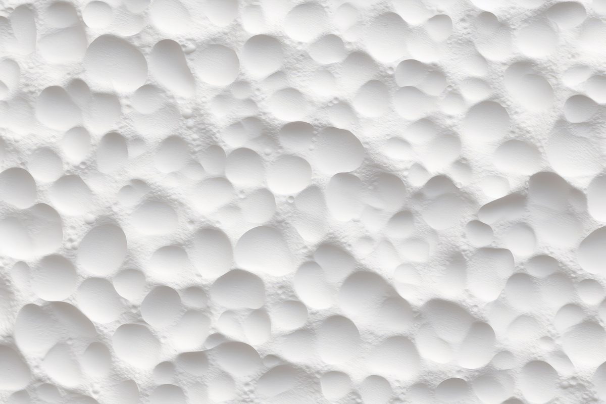 White punched wall texture photo