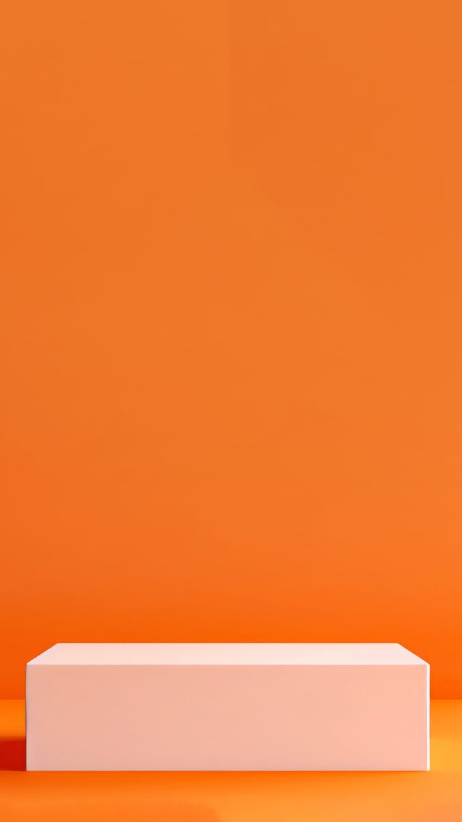 White squared podium for product presentation over a bright orange background