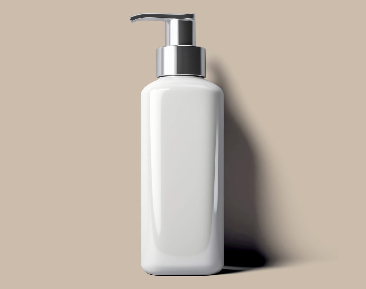 White ceramic dosing canister on neutral background