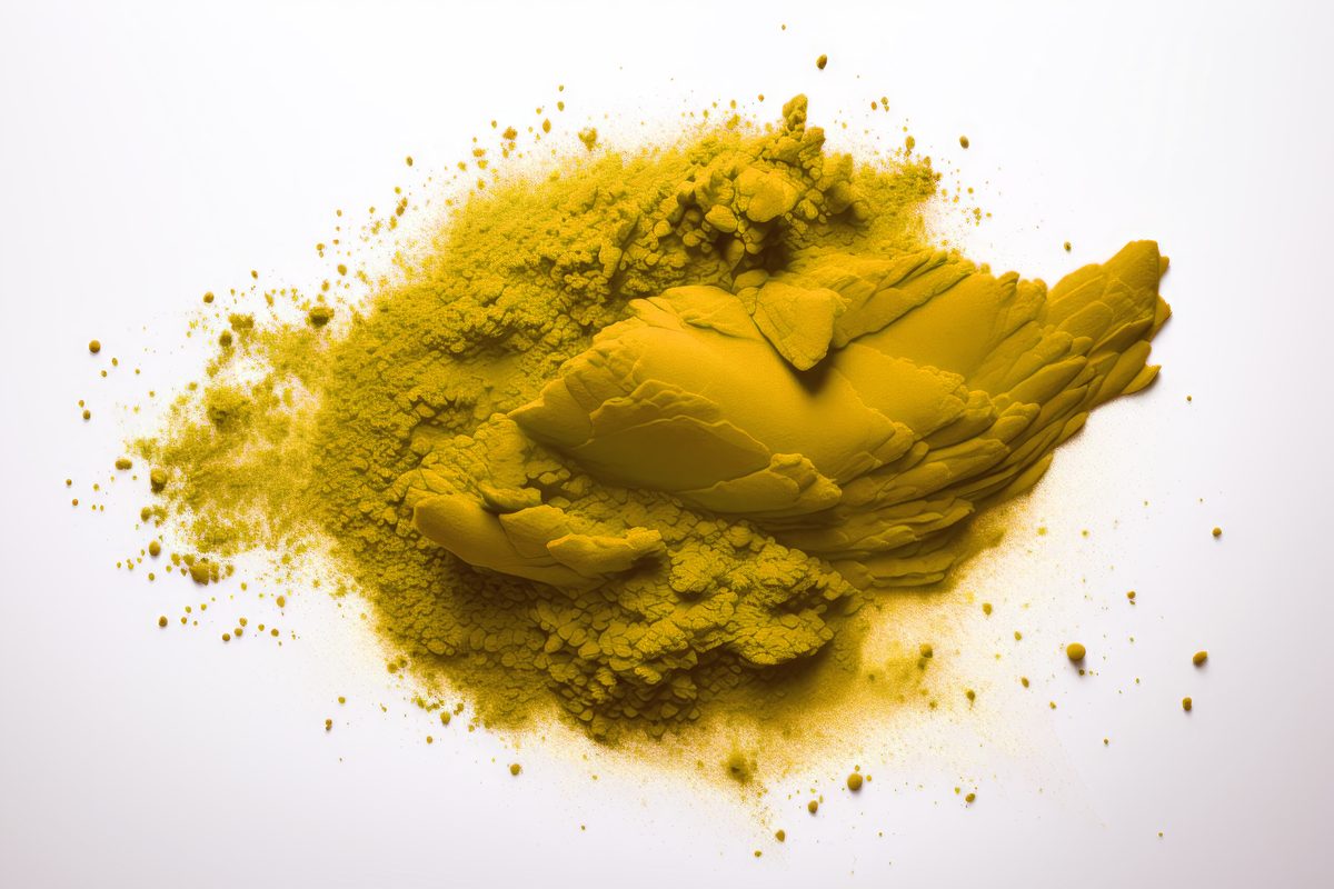 Holi Yellow Powder over White Background