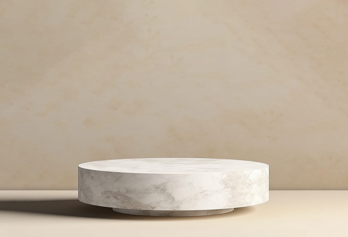 Minimalist light marble podium for product presentation on a soft background