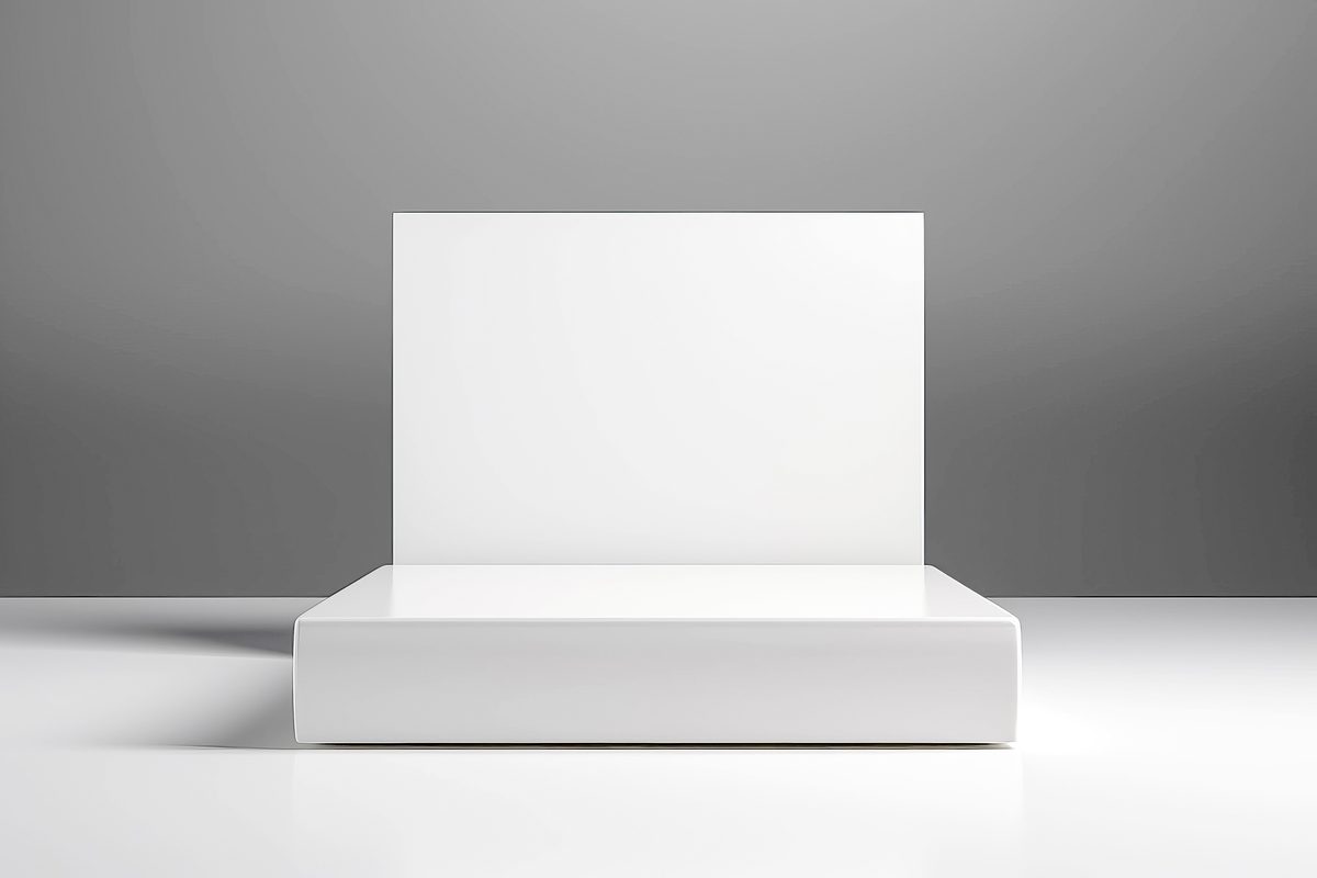 Minimalist white podium for product presentation on a grey background