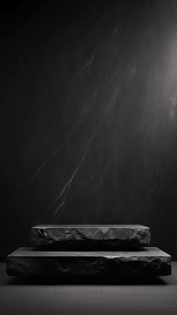 Squared rough black stone empty podium for product presentation on a black backdrop